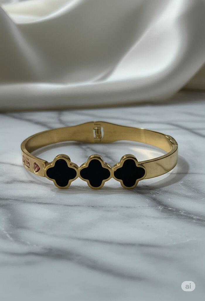 Luxurious Golden Bloom Clover Bracelet – Black Enamel & Crystal Accents