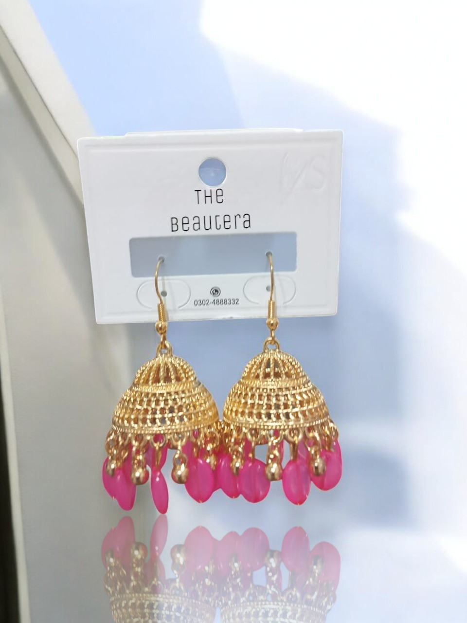 Gold Jhumka Earrings with Pearls – Traditional Design with Pink Drops